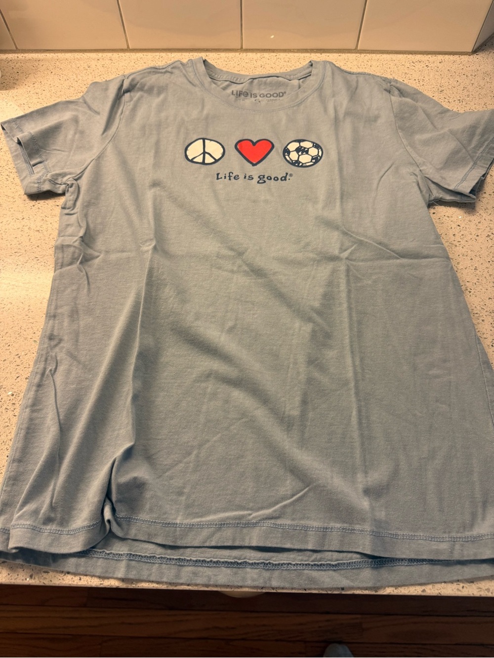 Life is Good Women's Light Blue Peace Heart Soccer Graphic Tee